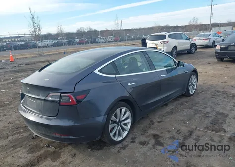 2018 Tesla Model 3 Long Range/Performance z USA, uszkodzony, nr VIN 5YJ3E1EB2JF116799